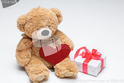 Image of Teddy Bears couple with red heart. Valentines Day concept.