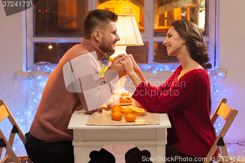 Image of Portrait of romantic couple at Valentine\'s Day dinner