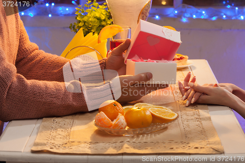 Image of Portrait of romantic couple at Valentine\'s Day dinner