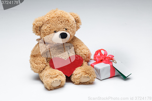 Image of Teddy Bears couple with red heart. Valentines Day concept.