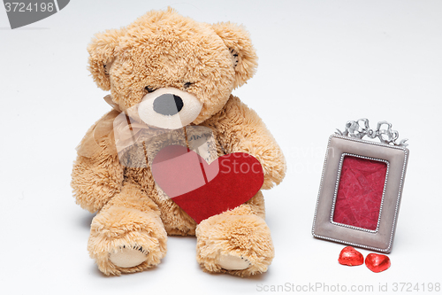 Image of Teddy Bears couple with red heart. Valentines Day concept.