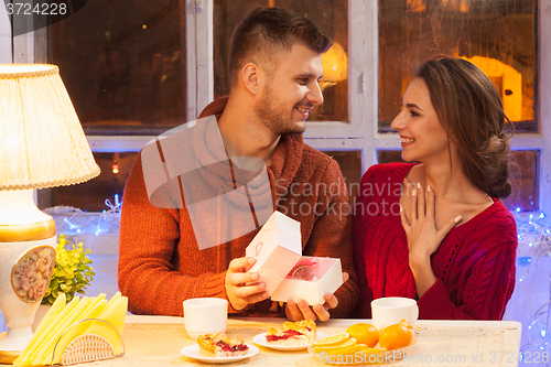 Image of Portrait of romantic couple at Valentine\'s Day dinner