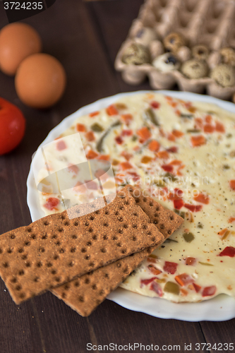 Image of baked omelette with different eggs and vegetables