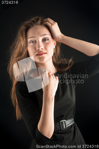 Image of Young attractive red-haired woman