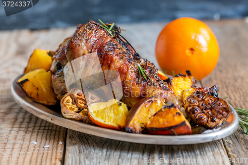 Image of Thigh of turkey baked with rosemary and orange.