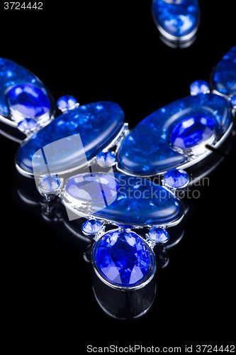 Image of plastic blue necklace