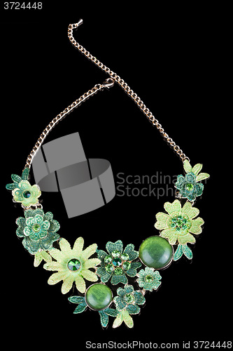 Image of metal feminine necklace. in the form of flowers