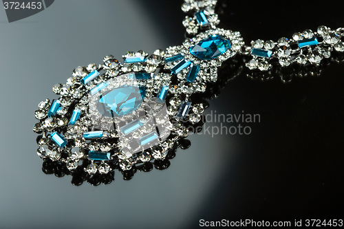 Image of Necklace with large jewels. on black background