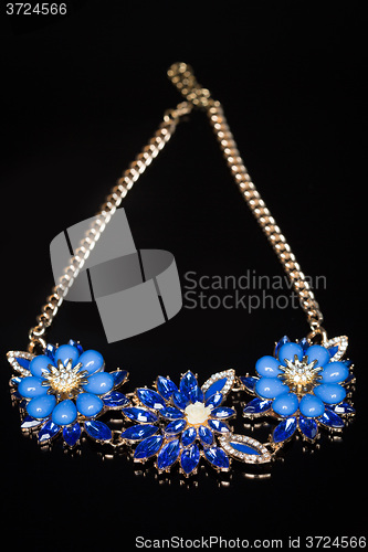 Image of plastic blue necklace