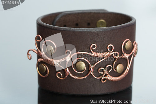 Image of bracelets. ornaments of copper wire