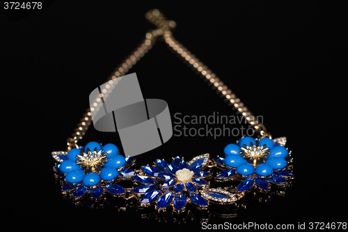 Image of plastic blue necklace