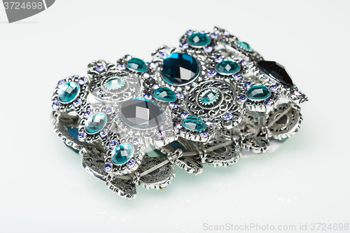 Image of Bracelet with blue stones over white