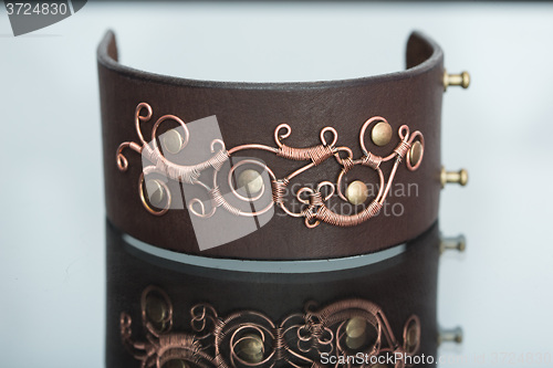 Image of bracelets. ornaments of copper wire