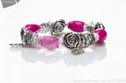 Image of multicolored beads bracelet in the form of roses