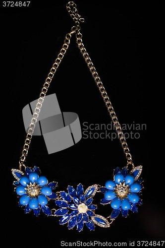 Image of plastic blue necklace