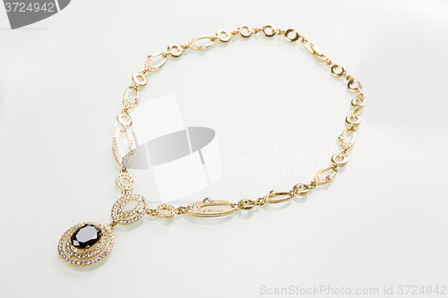 Image of Necklace with black pearls on a white 