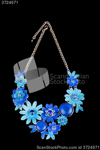 Image of metal feminine necklace. in the form of flowers