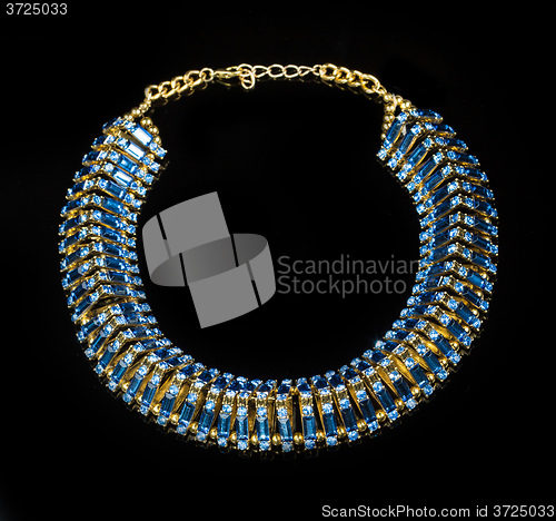 Image of plastic blue necklace