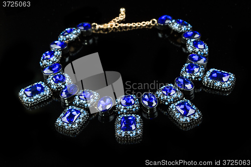 Image of plastic blue necklace