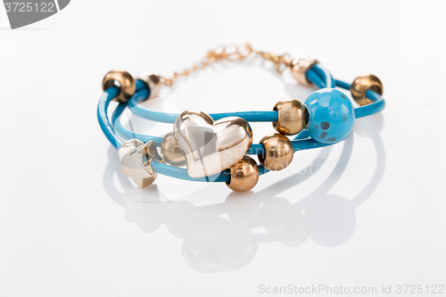 Image of Beautiful bracelets on white background.