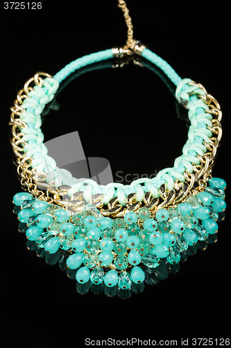 Image of green plastic  necklace