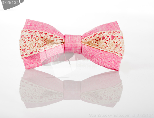 Image of pink bow tie with white lace