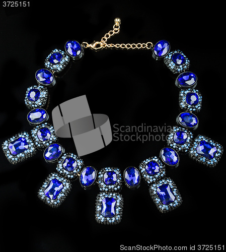 Image of plastic blue necklace