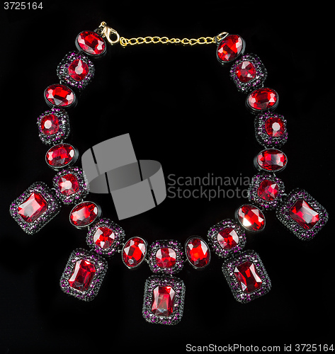 Image of red plastic  necklace