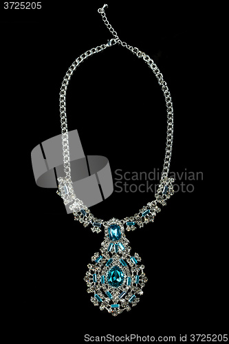 Image of Necklace with large jewels. on black background