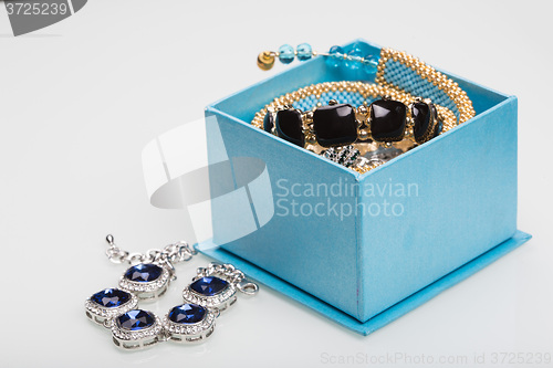 Image of Bracelet with blue stones in a box 