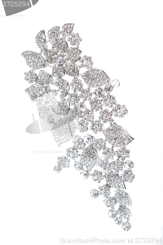Image of silver brooch with diamonds 