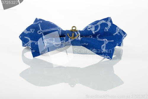 Image of blue bow tie with anchors 