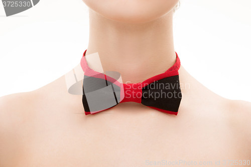 Image of red  black tie bow on female neck. 