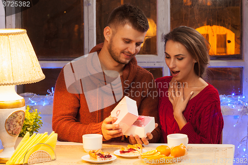 Image of Portrait of romantic couple at Valentine\'s Day dinner