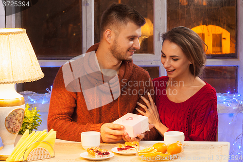 Image of Portrait of romantic couple at Valentine\'s Day dinner