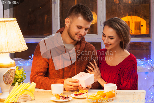 Image of Portrait of romantic couple at Valentine\'s Day dinner