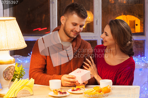 Image of Portrait of romantic couple at Valentine\'s Day dinner