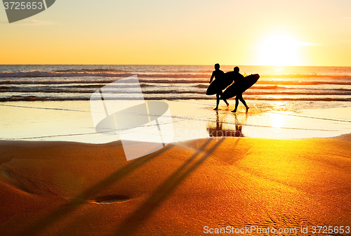 Image of Surfers on the beach