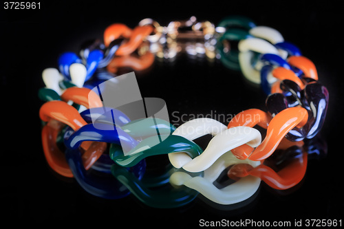 Image of plastic necklace. multicolored