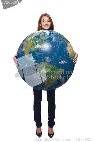 Image of Woman in full length holding earth globe