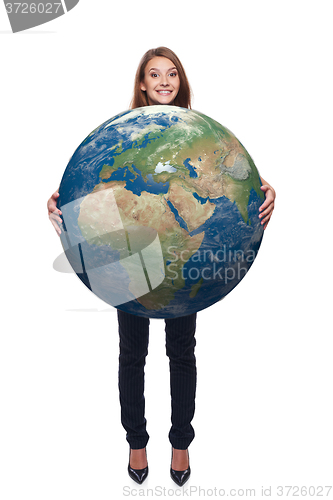 Image of Woman in full length holding earth globe