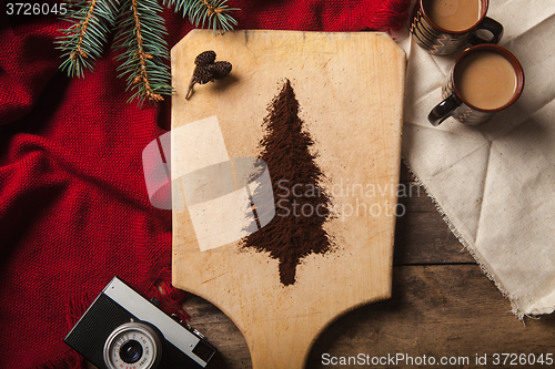 Image of The two cups of coffee on wooden background