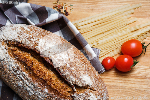 Image of The bread on an wooden background