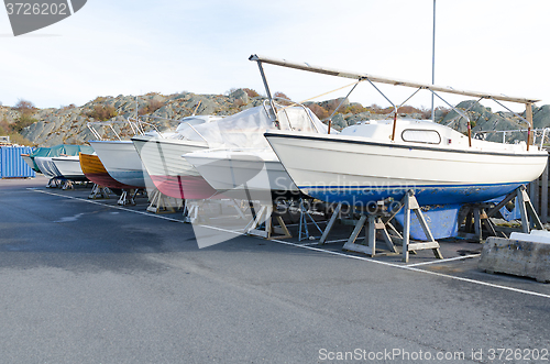 Image of many boat on storage for the winter