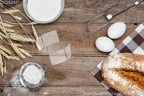 Image of The bread on an wooden background