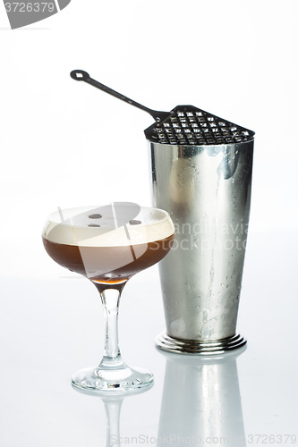 Image of Layered Chocolate Cocktail with Whipped Cream in Glass Isolated White Background