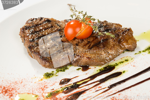 Image of Grilled steaks and vegetables