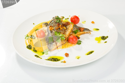 Image of Grilled Fish with tomato and Mixed Salad