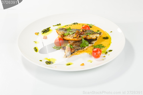 Image of Grilled Fish with tomato and Mixed Salad