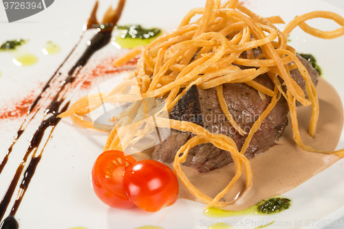 Image of Grilled steaks and vegetables